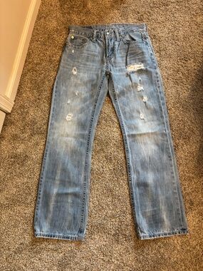 American Eagle Outfitters Light Blue Bootcut Jeans with Distressed Details
